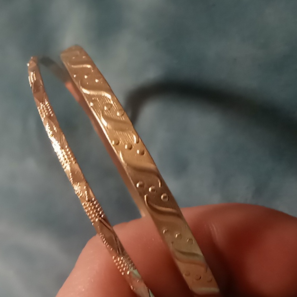 2 gold tone bangle bracelets